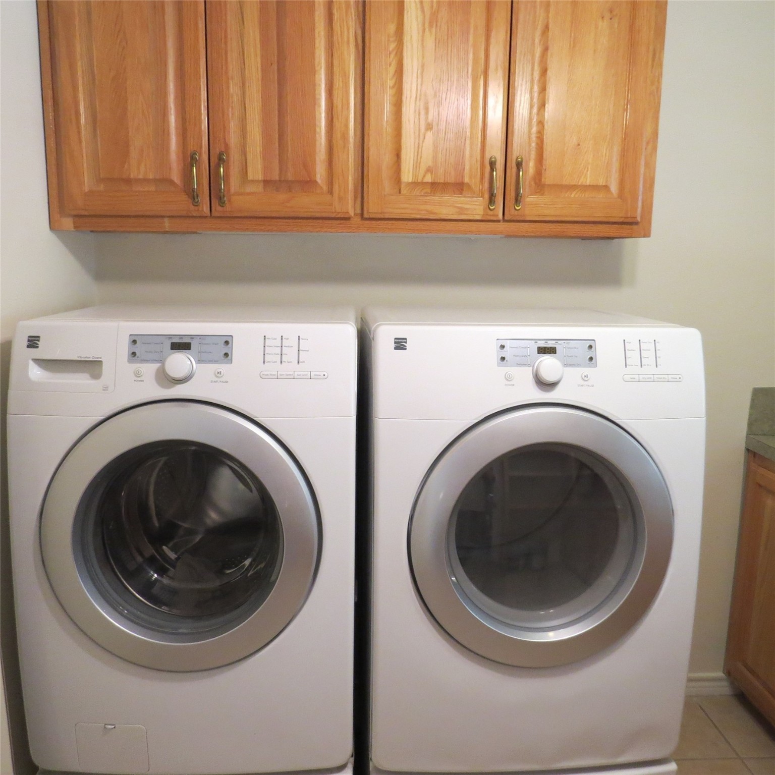 651 Sam Houston Loop Point Blank, TX 77364 - Photo 24 of 47 a close up view of washer and dryer