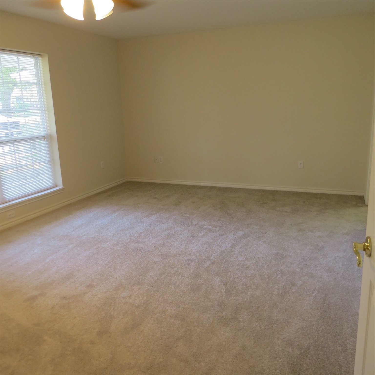 651 Sam Houston Loop Point Blank, TX 77364 - Photo 27 of 47 an empty room with a window
