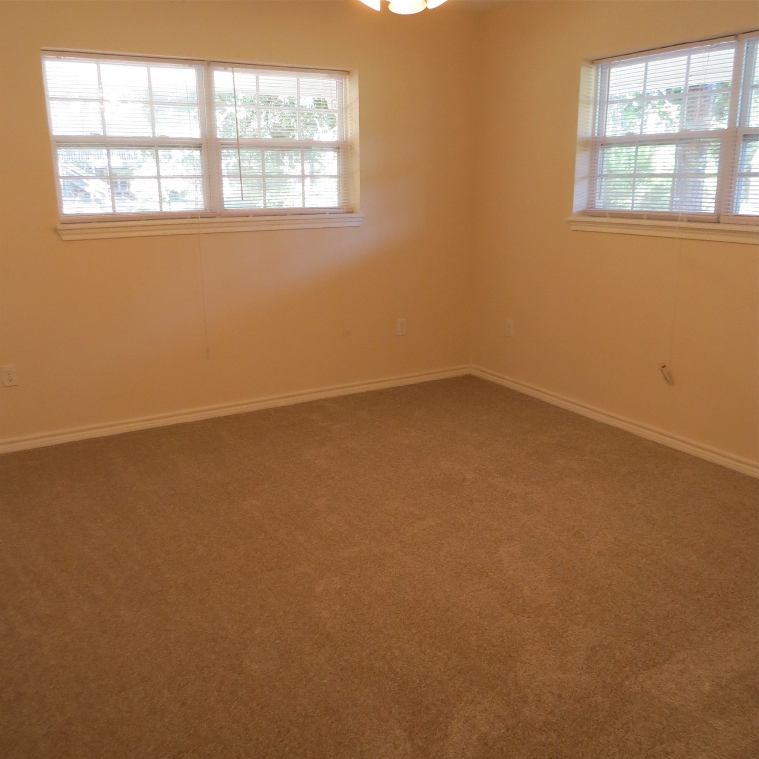 651 Sam Houston Loop Point Blank, TX 77364 - Photo 33 of 47 an empty room with a window