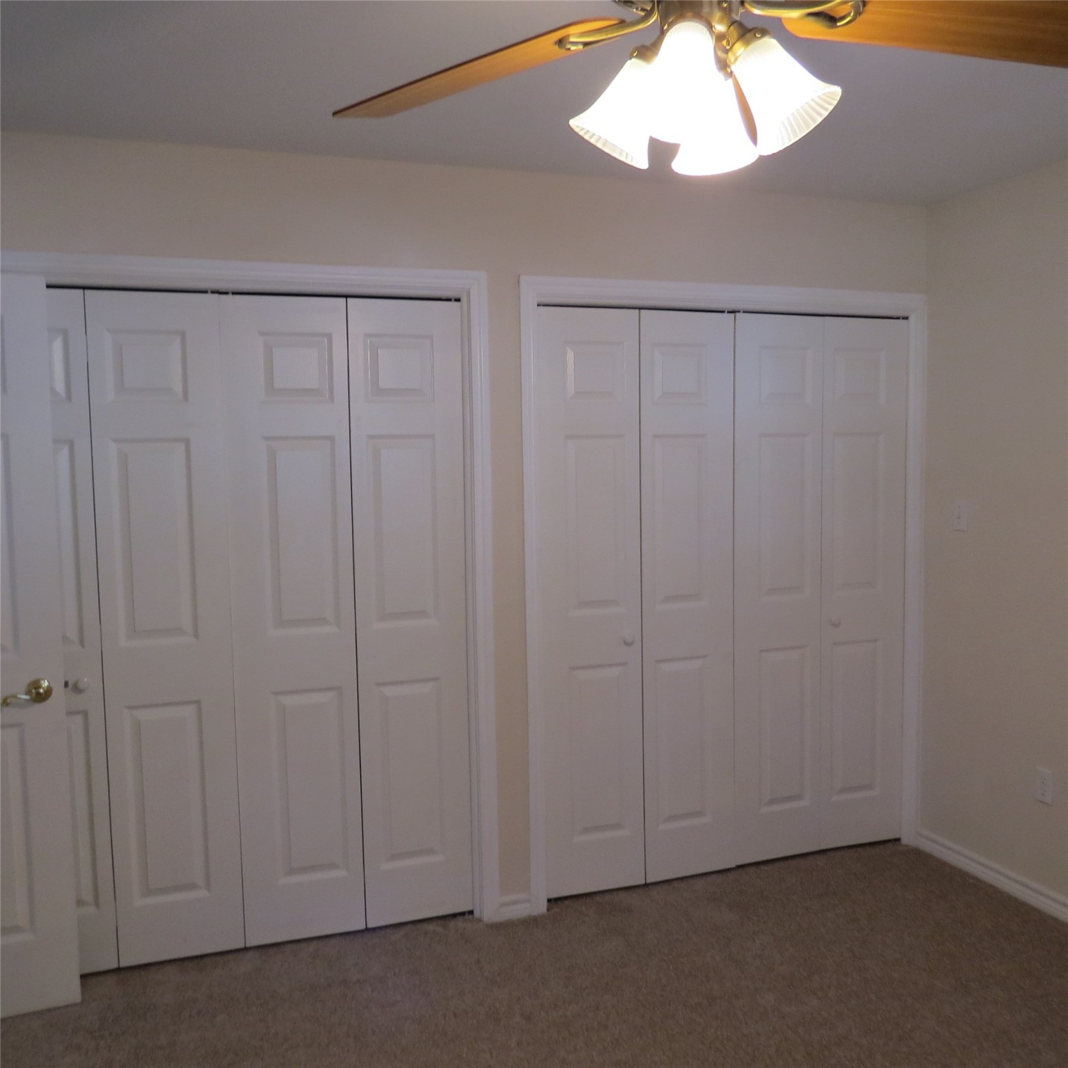 651 Sam Houston Loop Point Blank, TX 77364 - Photo 34 of 47 an empty room with chandelier fan