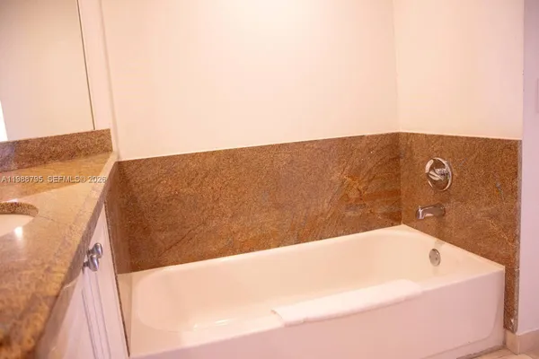 a terrace with a bathtub