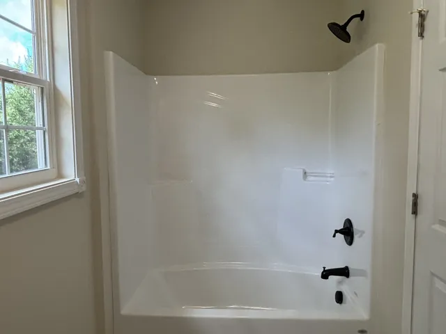 a bathroom with a bathtub