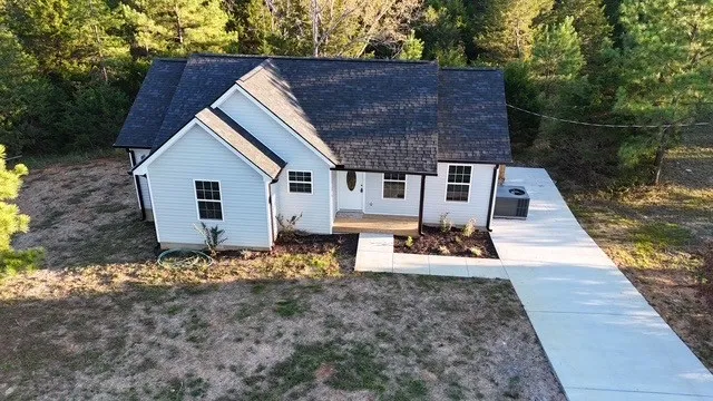 a view of house with outdoor space