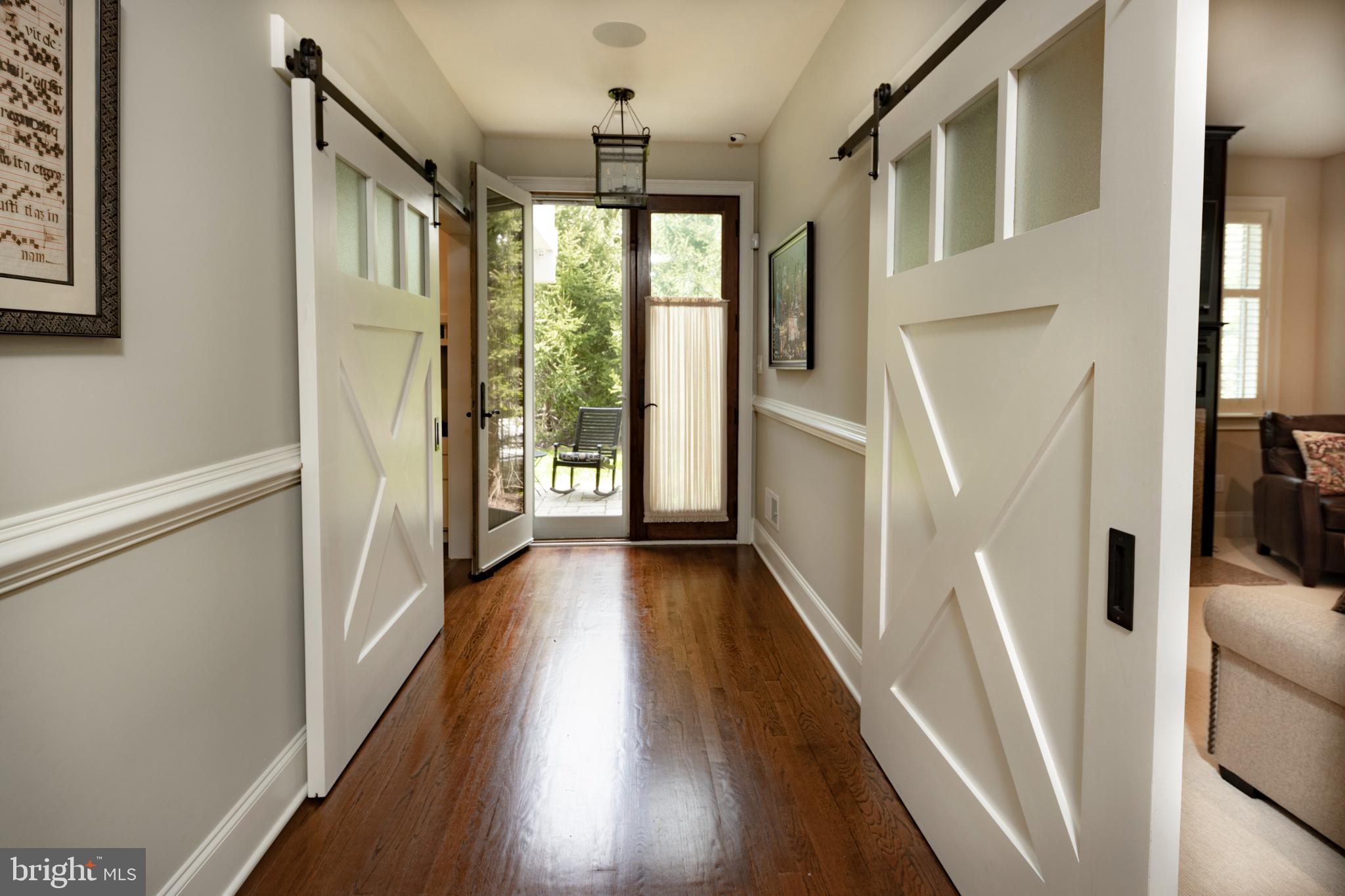 2 Madison Lane Wayne, PA 19087 - Photo 5 of 33 First floor hallway to covered porch