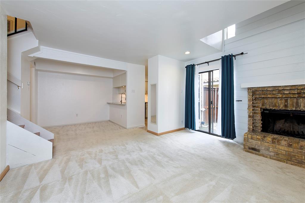 5626 Preston Oaks Road, Unit 5A Dallas, TX 75254 - Photo 20 of 20 Light and bright open floorplan with fenced patio through sliding doors.