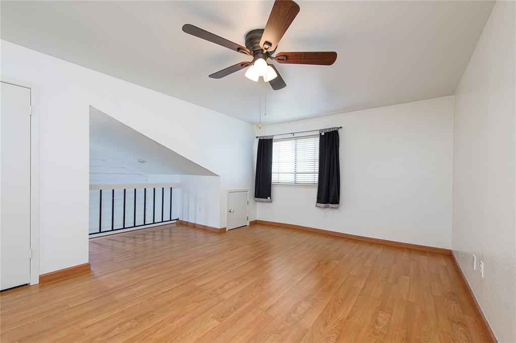 5626 Preston Oaks Road, Unit 5A Dallas, TX 75254 - Photo 19 of 20 Second living room with ceiling fan.