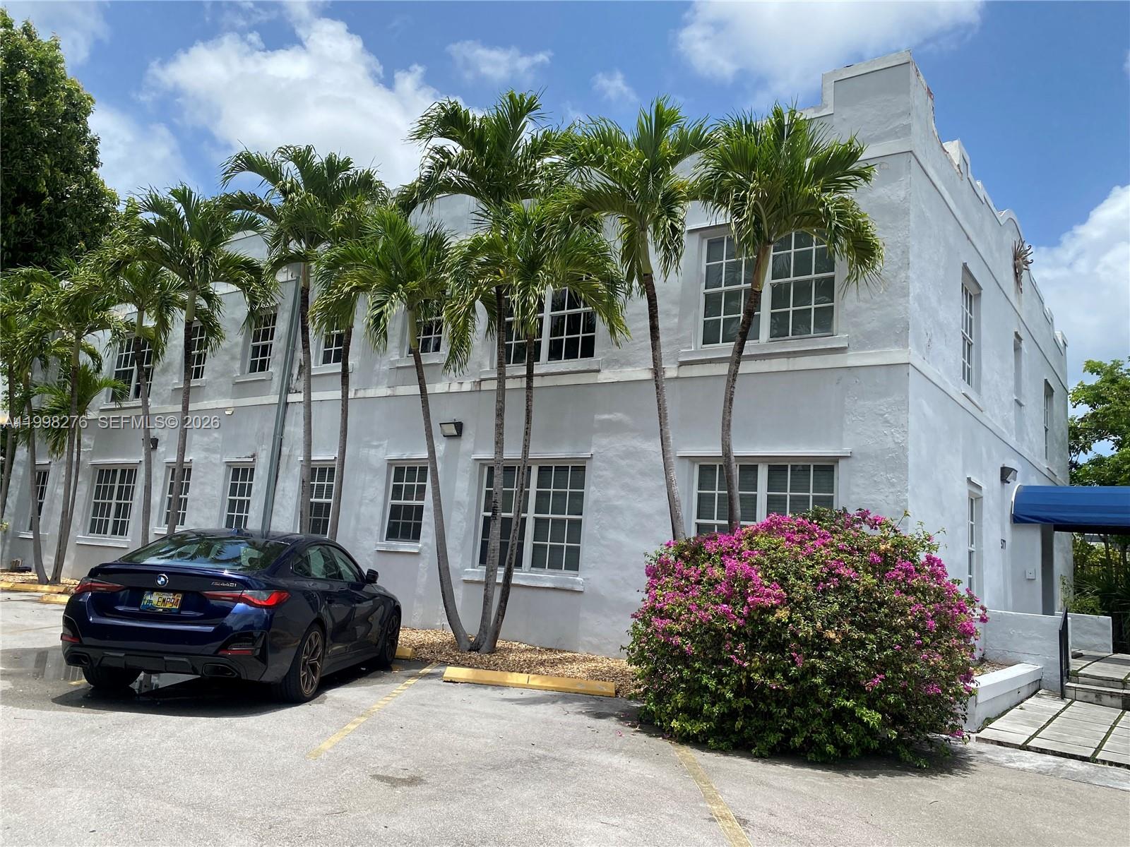 577 Northeast 62nd Street, Unit 8 Miami, FL 33138 - Photo 17 of 21 a car parked in front of a houses