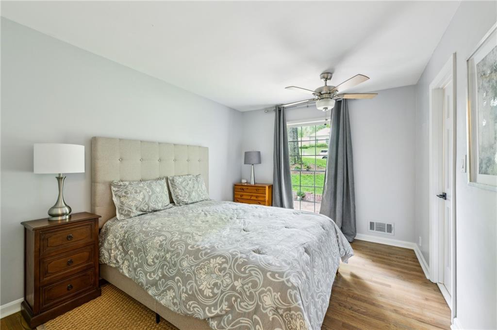 1130 Angelo Court Northeast Atlanta, GA 30319 - Photo 24 of 38 a bedroom with a bed and a window