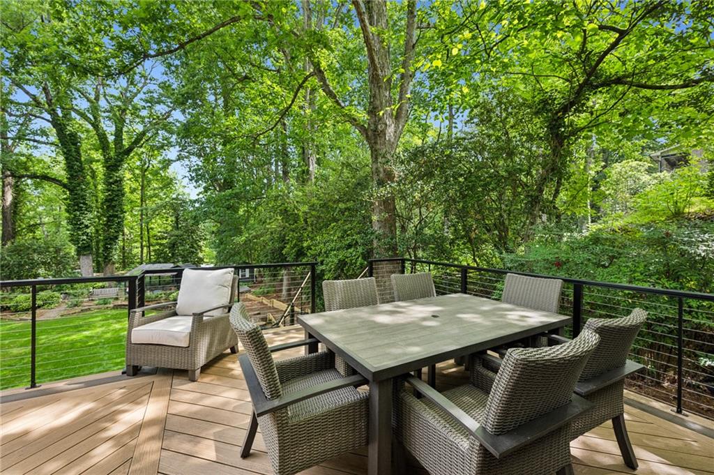 1130 Angelo Court Northeast Atlanta, GA 30319 - Photo 36 of 38 a view of a dinning table and chairs on the roof deck