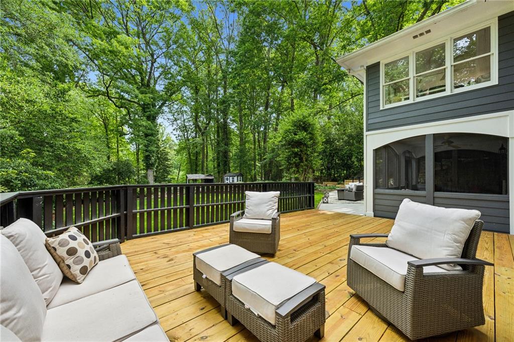 1130 Angelo Court Northeast Atlanta, GA 30319 - Photo 38 of 38 a view of a patio with couches chairs and wooden floor