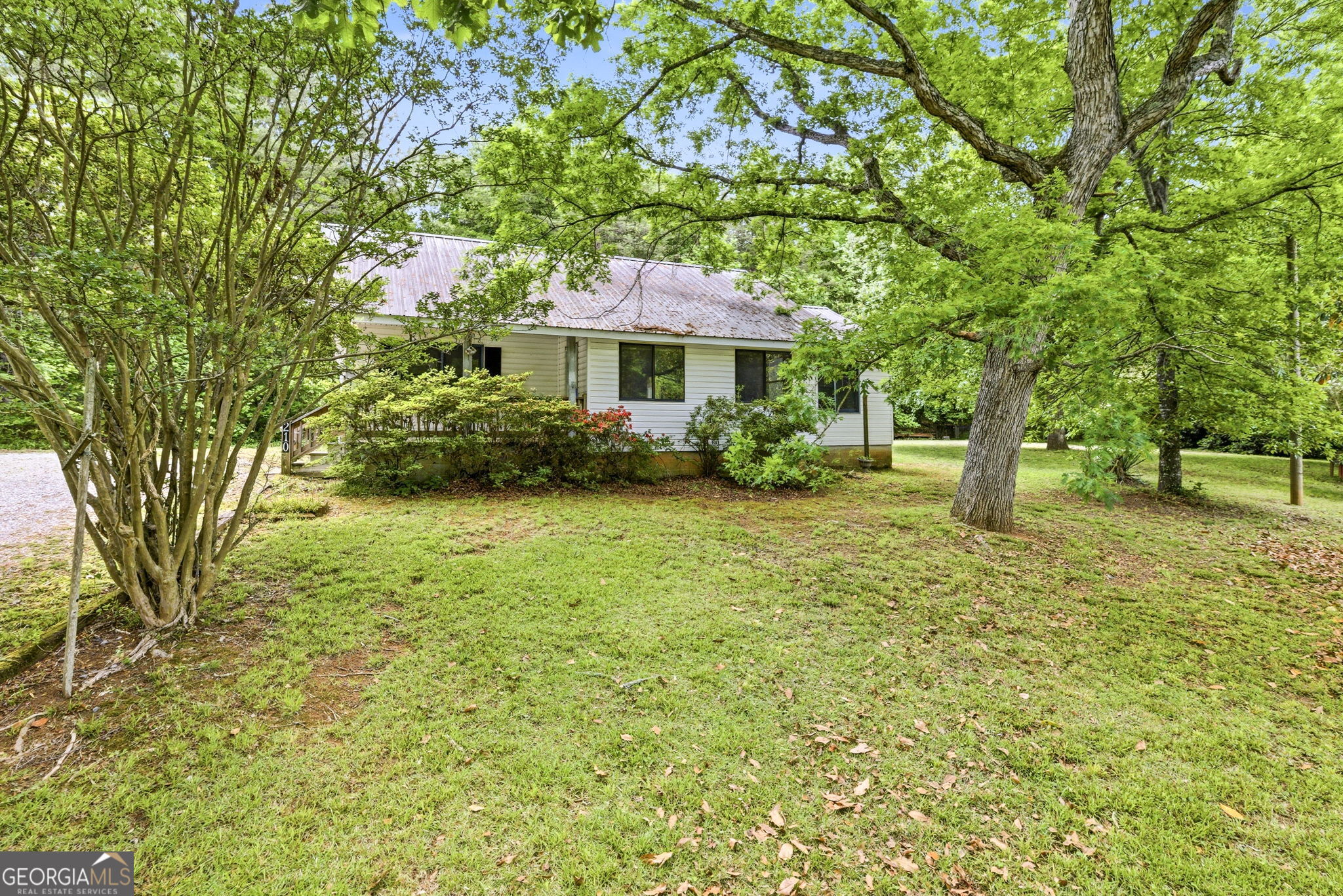 210 Kentucky Street Demorest, GA 30535 - Photo 3 of 30 a view of a garden