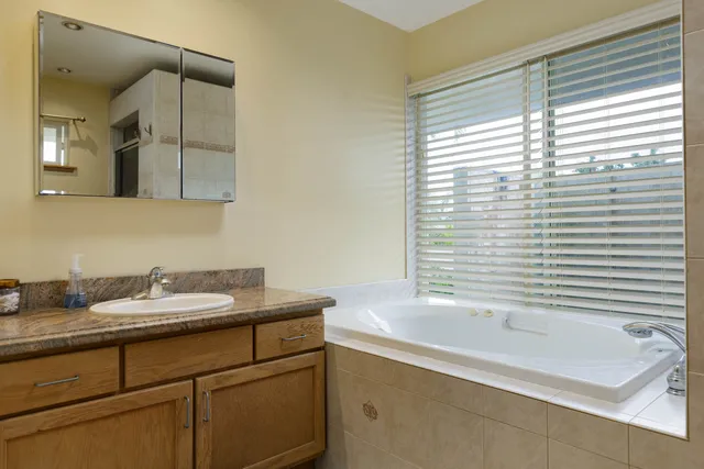 a bathroom with a sink and a bathtub