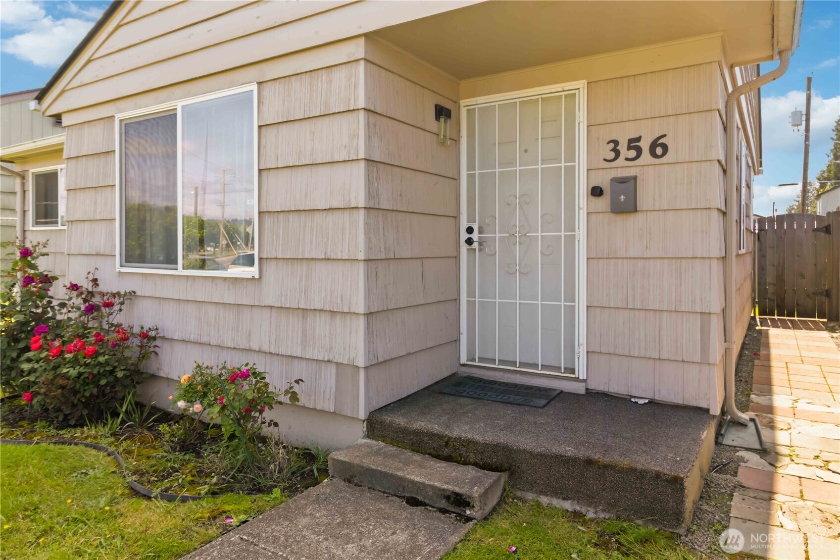 356 28th Avenue Longview, WA 98632 - Photo 5 of 24 a view of a house with a flower garden