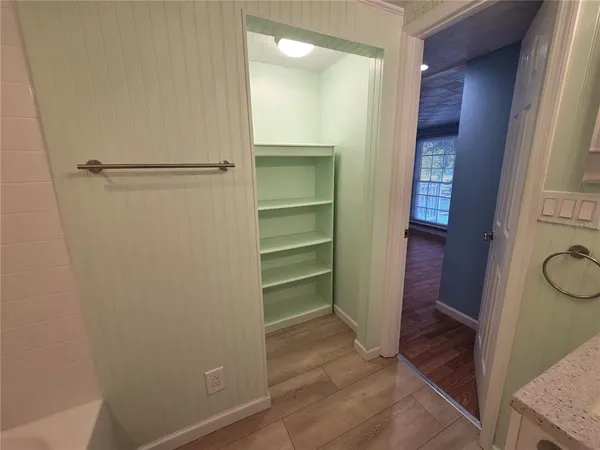 a view of an empty walk in closet
