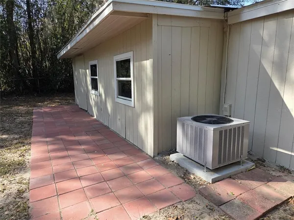 a view of a door and chair in the room