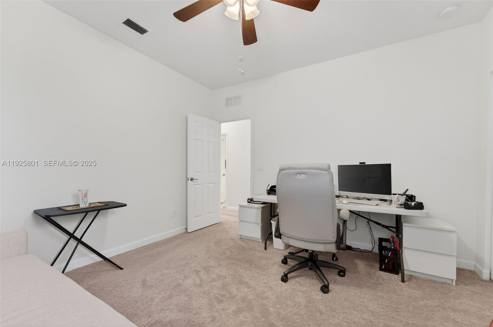 6978 Broadland Way Pompano Beach, FL 33073 - Photo 22 of 56 a view of a workspace with furniture