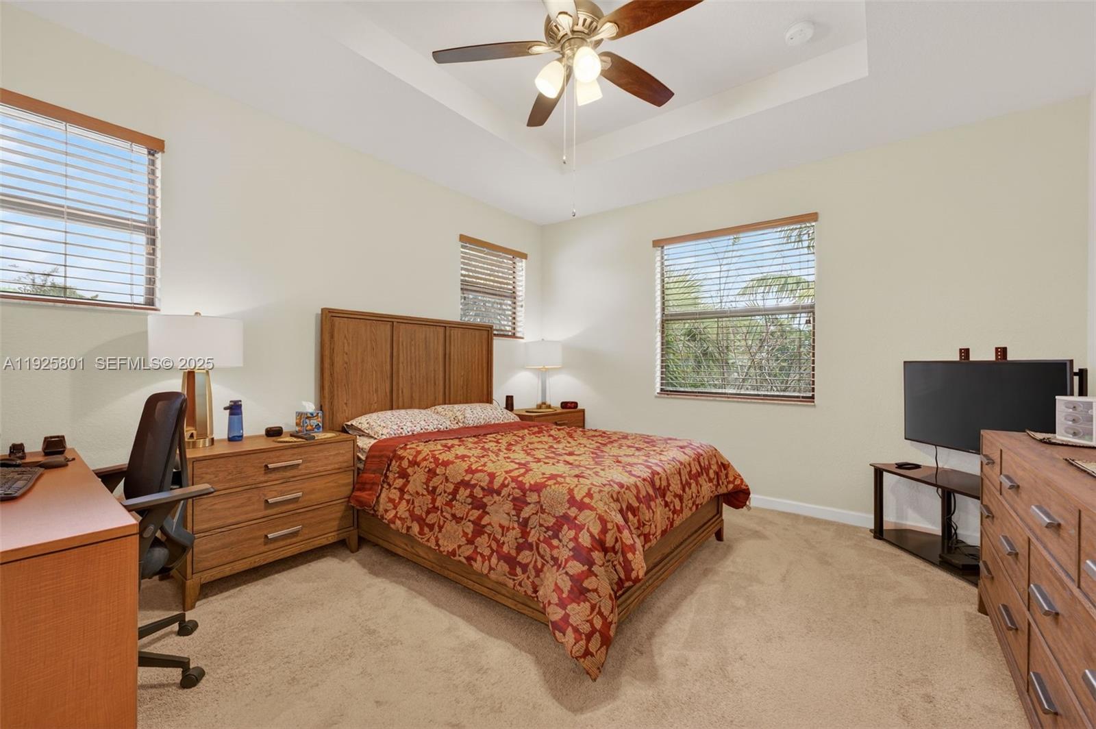 6978 Broadland Way Pompano Beach, FL 33073 - Photo 29 of 56 a bedroom with a bed and a window