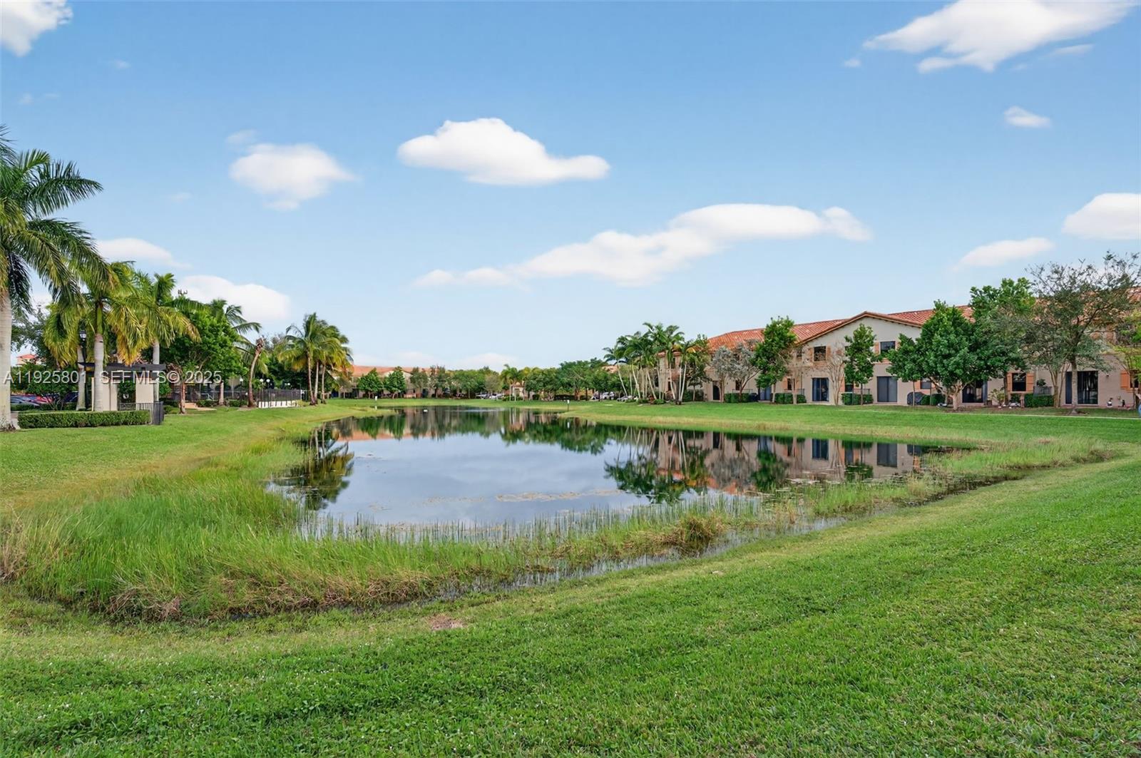 6978 Broadland Way Pompano Beach, FL 33073 - Photo 3 of 56 a view of a lake with houses in back