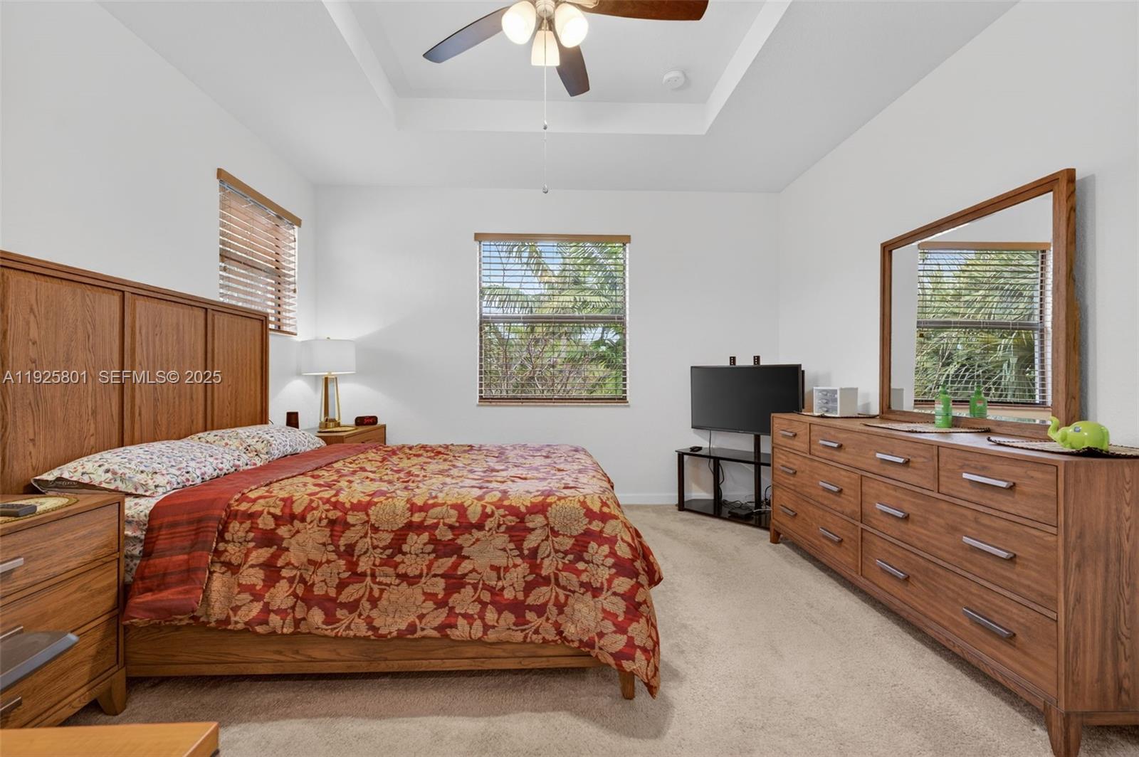 6978 Broadland Way Pompano Beach, FL 33073 - Photo 32 of 56 a bedroom with a bed and a window