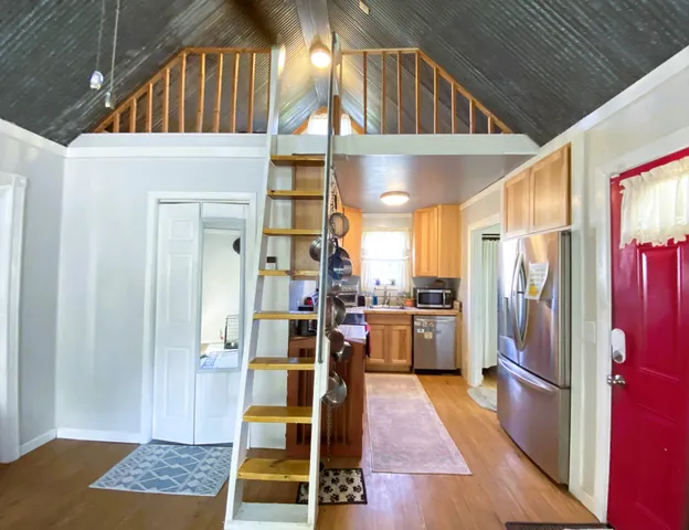 a view of a livingroom with a ceiling fan