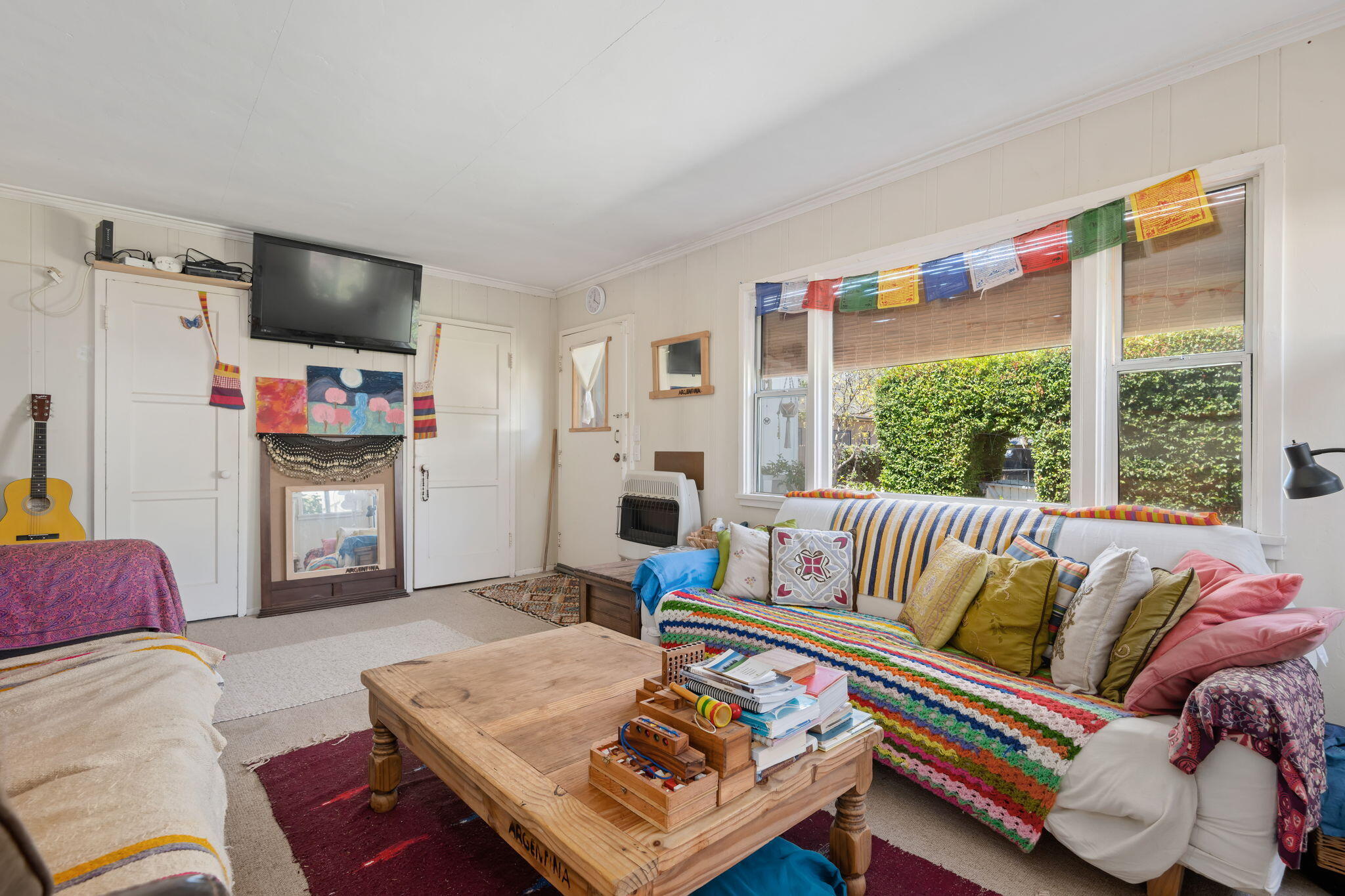 1090 Vallecito Road Carpinteria, CA 93013 - Photo 12 of 24 a living room with furniture and a flat screen tv