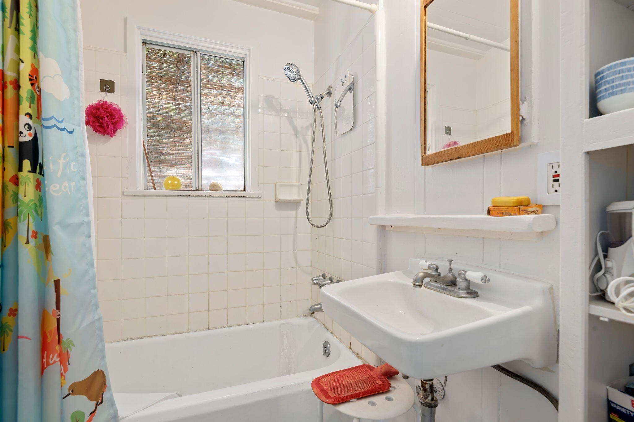 1090 Vallecito Road Carpinteria, CA 93013 - Photo 15 of 24 a bathroom with a sink and a mirror