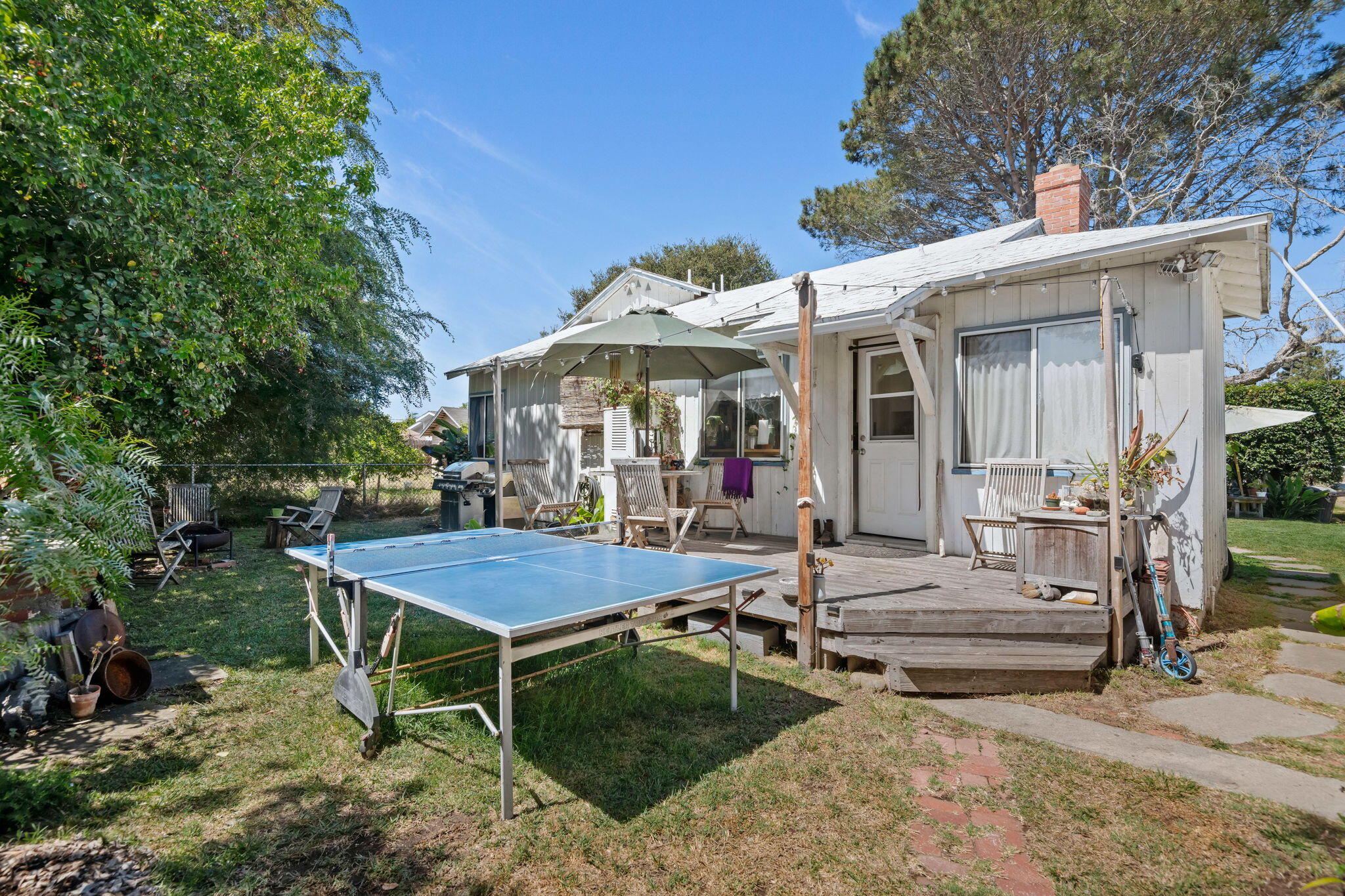1090 Vallecito Road Carpinteria, CA 93013 - Photo 20 of 24 a view of a wooden chairs and table in the patio