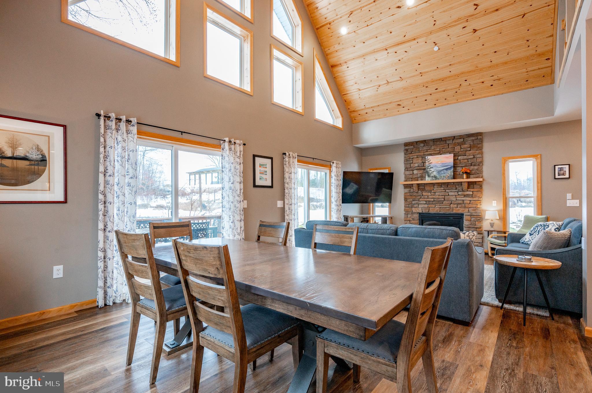 226 Wisp Adventure Road McHenry, MD 21541 - Photo 11 of 67 a view of a dining room with furniture window and wooden floor