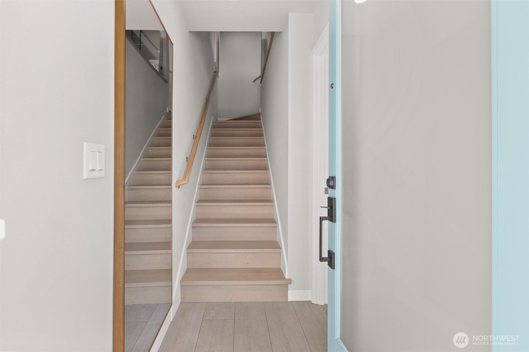 3638 36th Avenue South, Unit D Seattle, WA 98144 - Photo 19 of 21 a view of staircase with white walls and white door