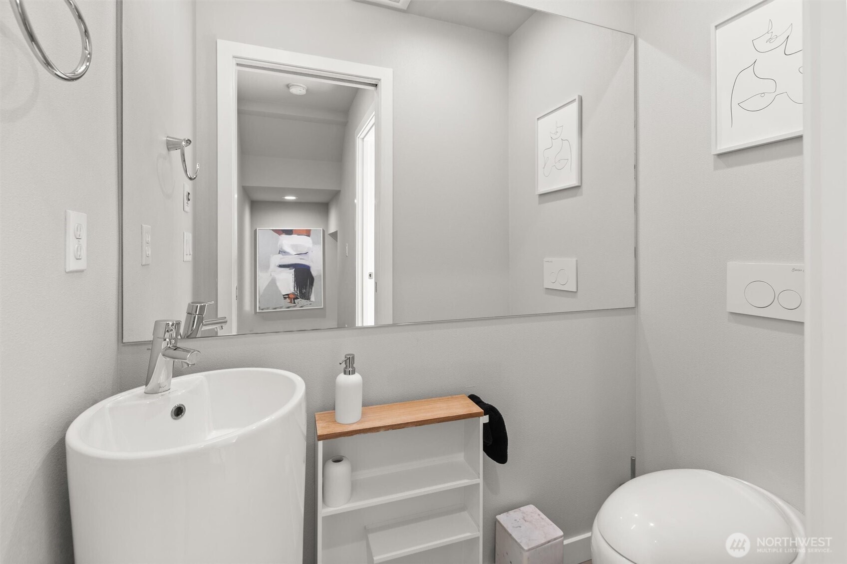 3638 36th Avenue South, Unit D Seattle, WA 98144 - Photo 9 of 21 a bathroom with a sink mirror and toilet