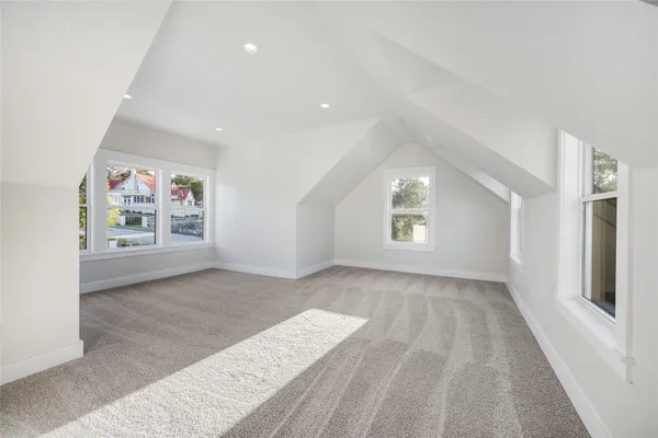 a view of storage and utility room with a window
