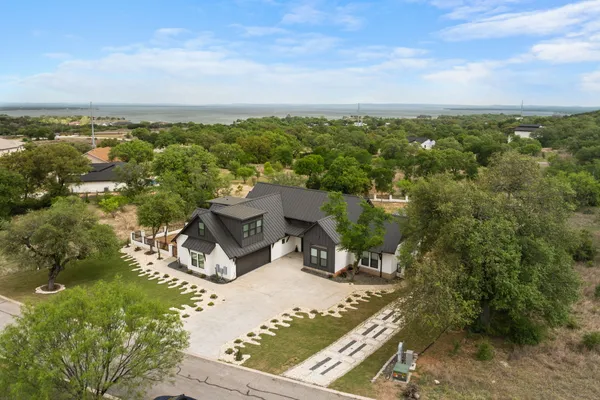 an aerial view of residential building with parking space