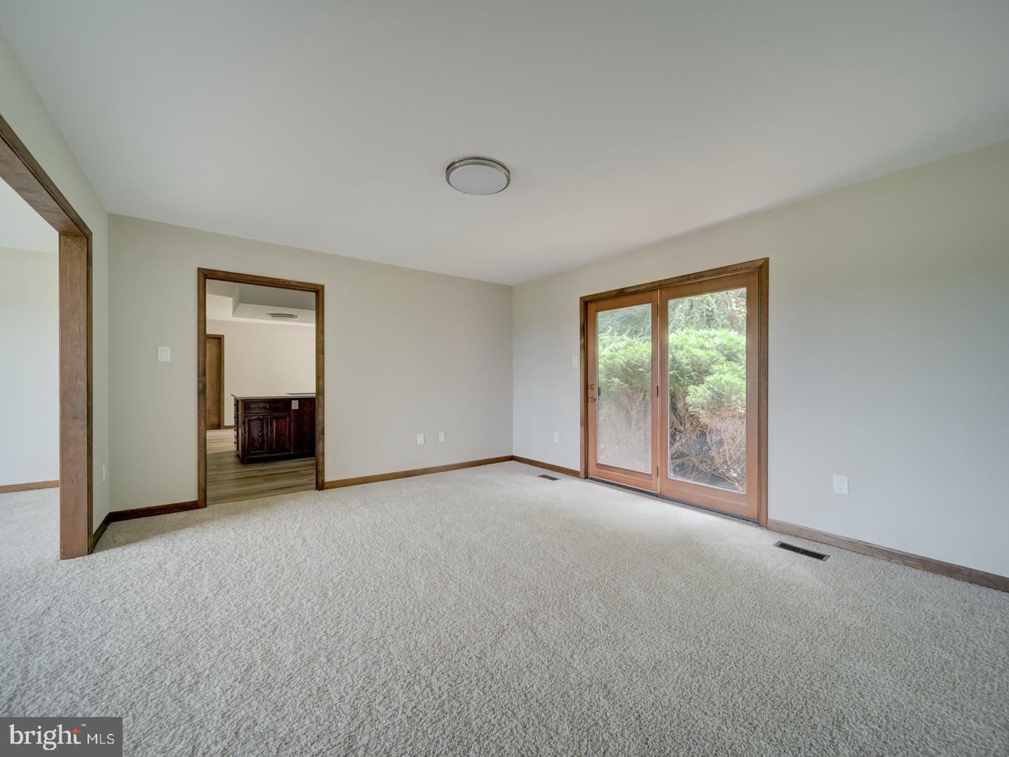 2750 Ridge Road Westminster, MD 21157 - Photo 31 of 57 an empty room with windows and door