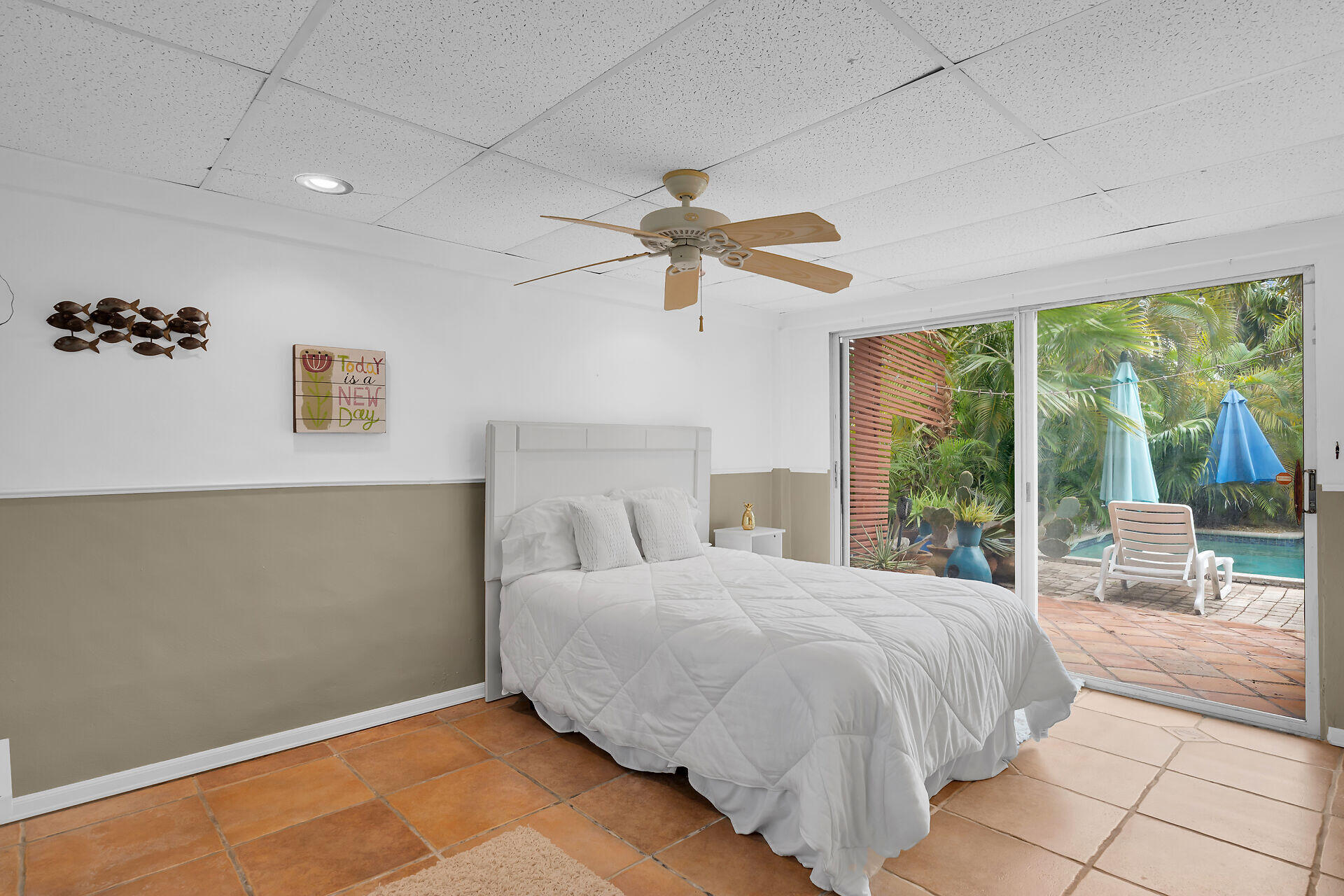 42 Treasure Road Marathon, FL 33050 - Photo 32 of 70 a bedroom with a bed and a large window
