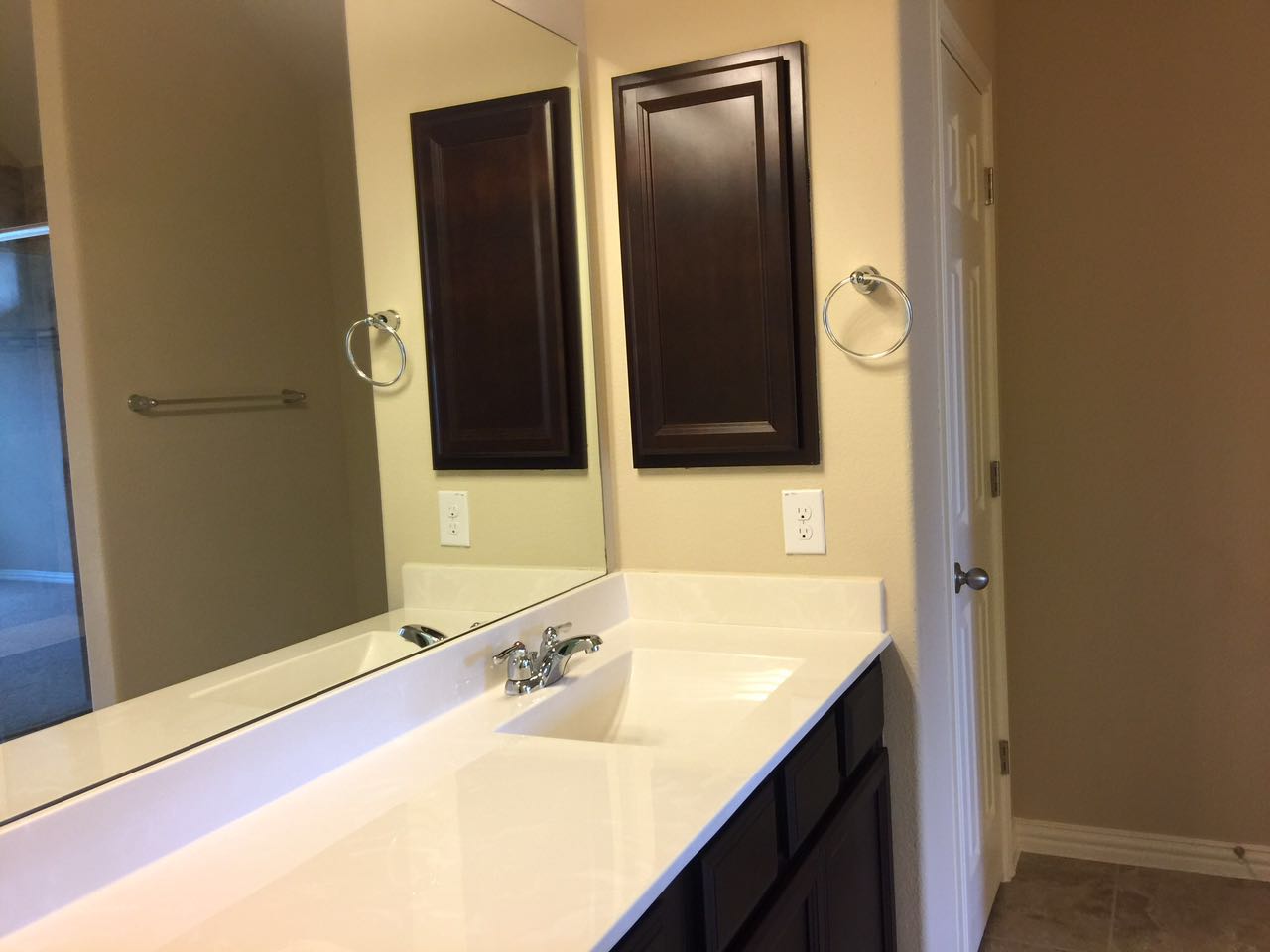 8337 Angelo Loop Round Rock, TX 78665 - Photo 14 of 22 a bathroom with a sink and a mirror
