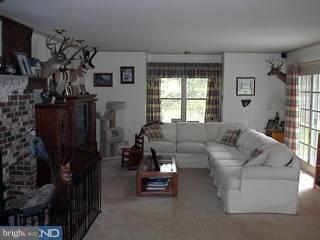 44 New Road Tabernacle, NJ 08088 - Photo 4 of 6 a living room with furniture and a flat screen tv