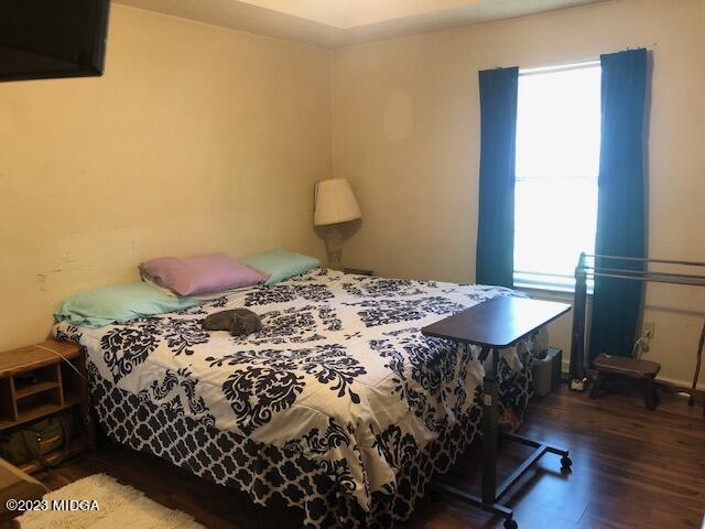 745 Taylor Road Juliette, GA 31046 - Photo 11 of 16 a bedroom with a bed dresser and a window