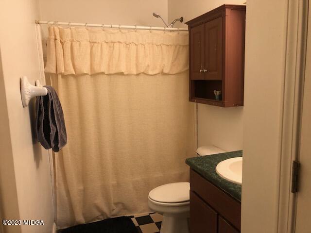 745 Taylor Road Juliette, GA 31046 - Photo 12 of 16 a bathroom with a sink toilet and shower