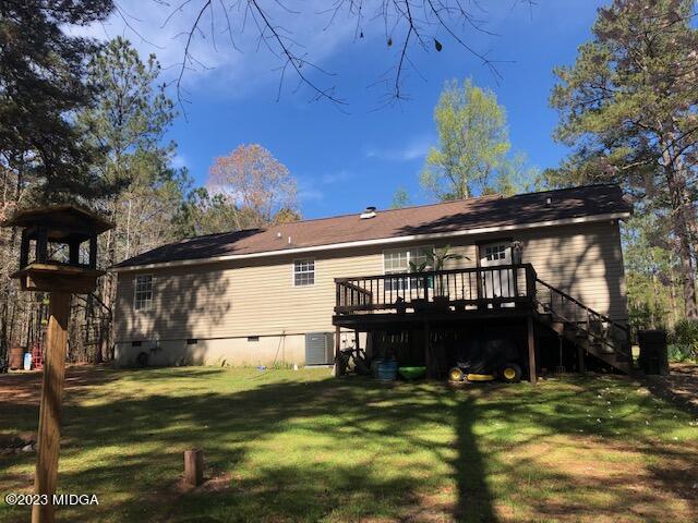 745 Taylor Road Juliette, GA 31046 - Photo 14 of 16 a view of a house with a yard