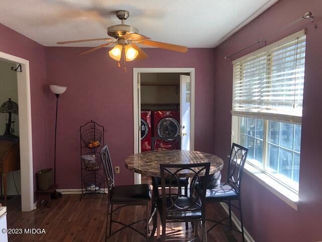 745 Taylor Road Juliette, GA 31046 - Photo 5 of 16 a view of a dining room with furniture and chandelier