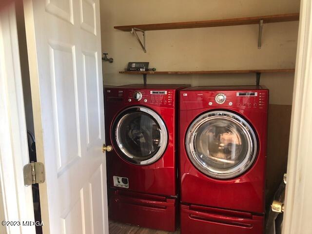 745 Taylor Road Juliette, GA 31046 - Photo 6 of 16 a view of a hallway with washer and dryer
