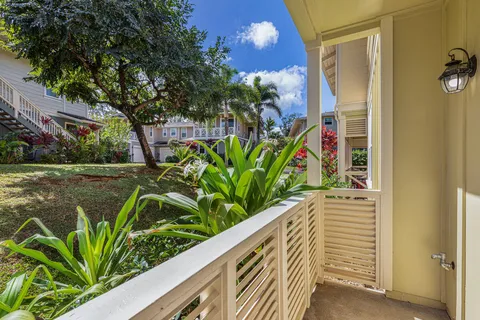 a view of a plant in a balcony