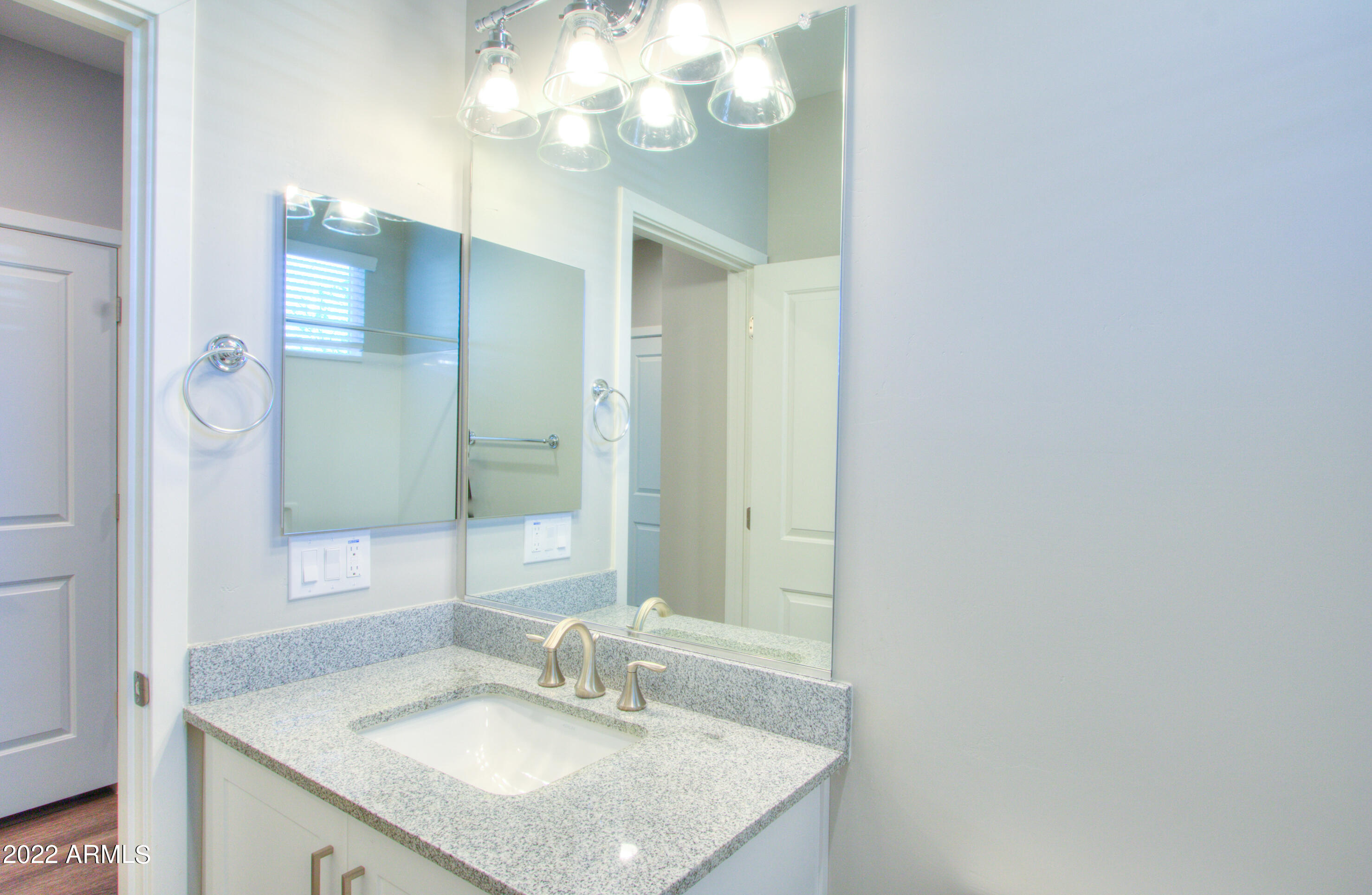 2245 North Dayton Street, Unit 3 Phoenix, AZ 85006 - Photo 20 of 26 a bathroom with a sink vanity and a mirror