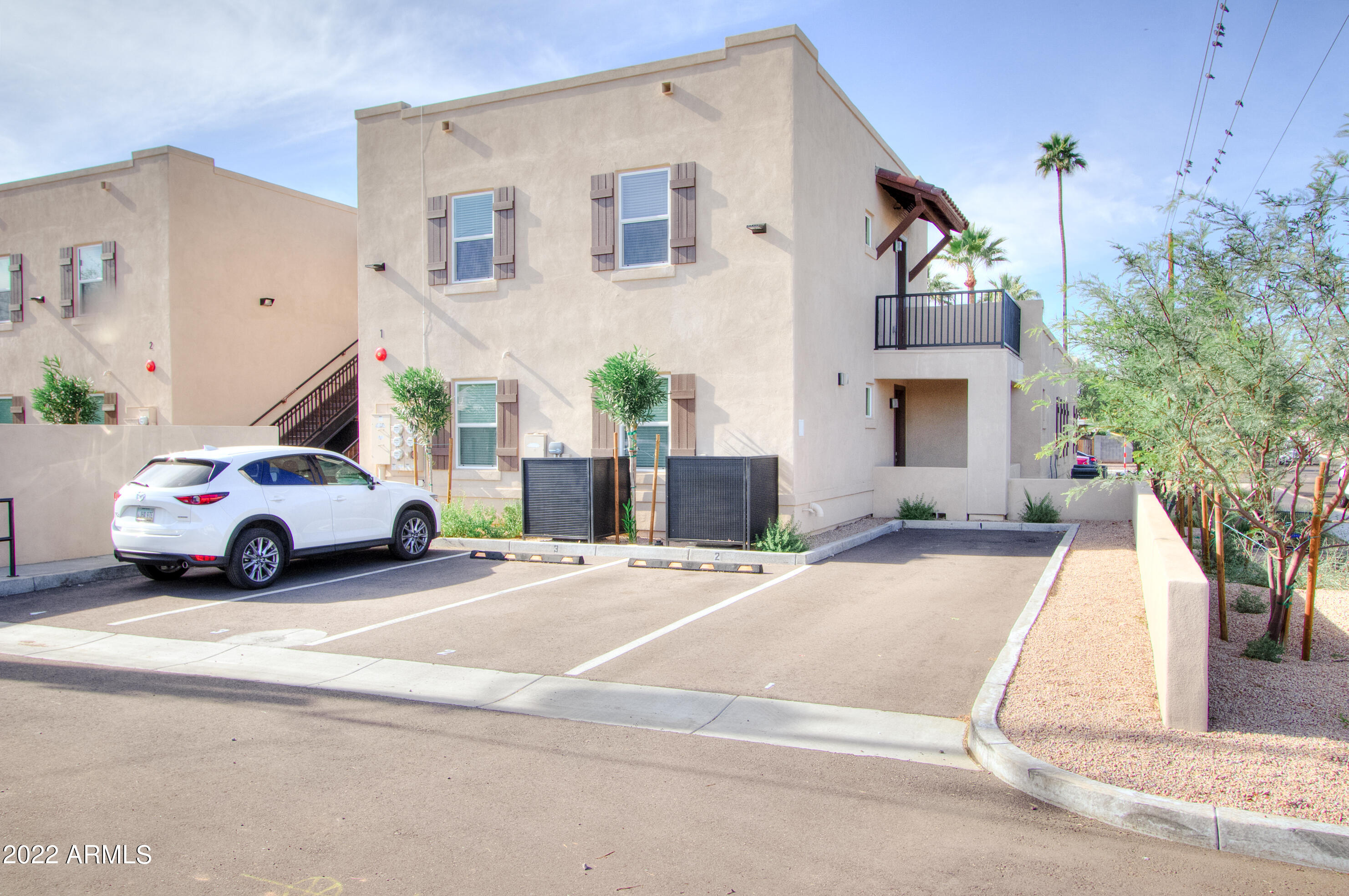 2245 North Dayton Street, Unit 3 Phoenix, AZ 85006 - Photo 24 of 26 a view of car parked in front of house