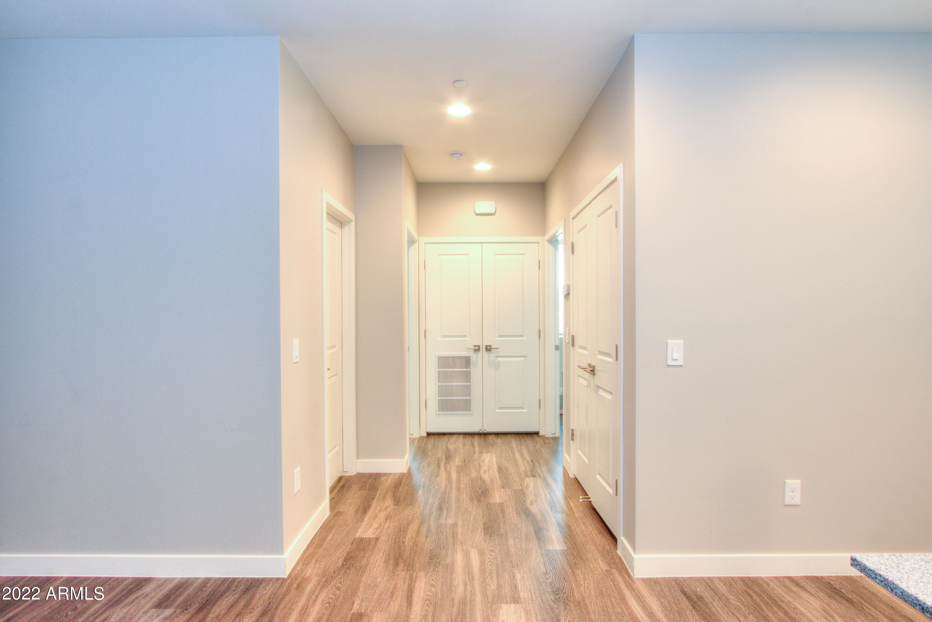 2245 North Dayton Street, Unit 3 Phoenix, AZ 85006 - Photo 10 of 26 a view of a hallway with wooden floor