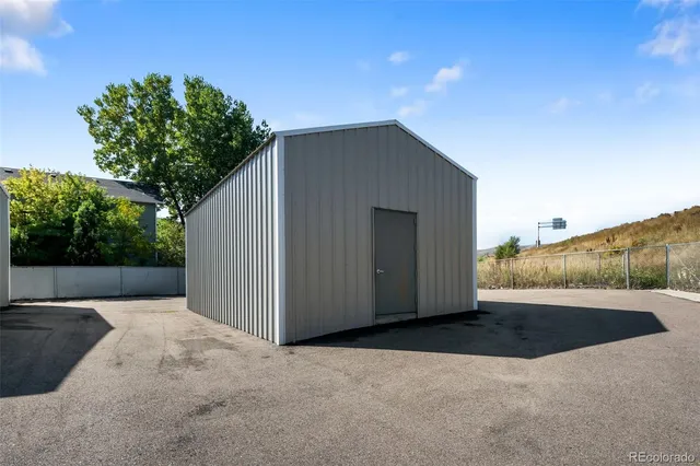a view of backyard with green space