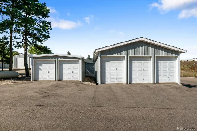 a front view of a house with a garage