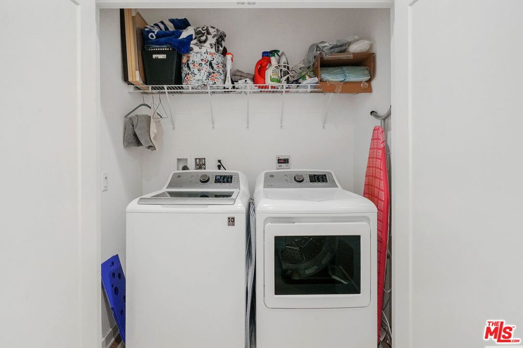 305 Placemark Irvine, CA 92614 - Photo 13 of 20 a utility room with dryer and washer