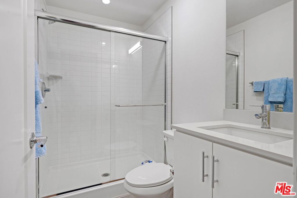 305 Placemark Irvine, CA 92614 - Photo 7 of 20 a bathroom with a sink toilet and shower