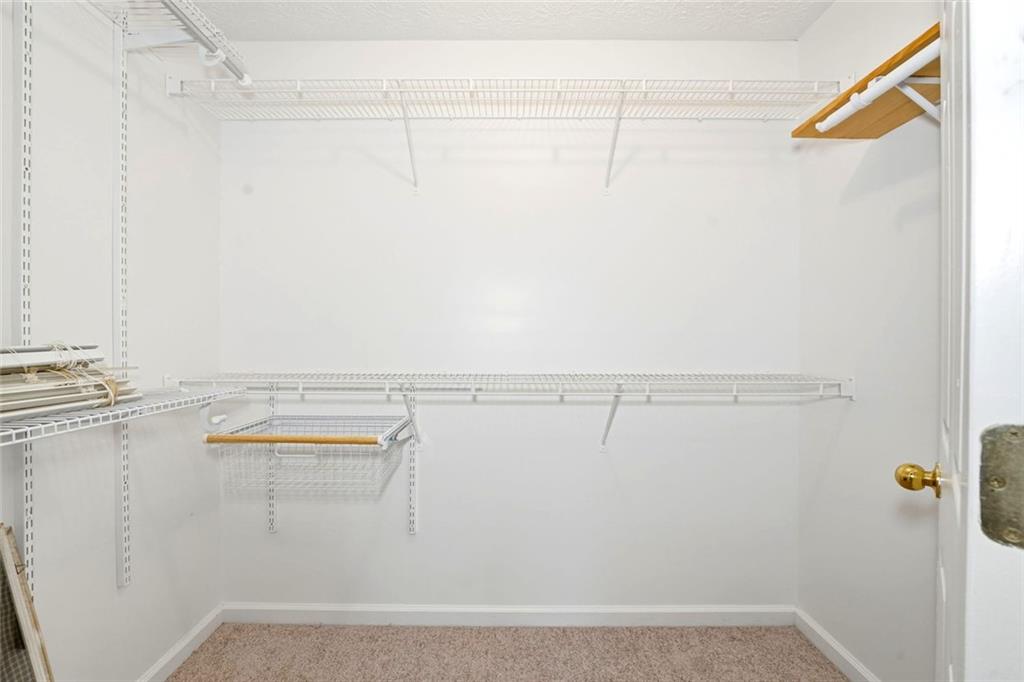 4099 Harvest Ridge Drive Douglasville, GA 30135 - Photo 22 of 46 a view of walk in closet